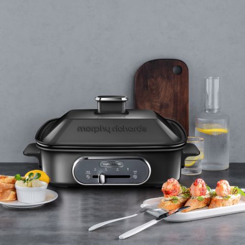 Multifunction Cooking Pot in black with prawn canapes